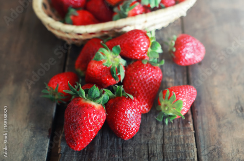 fresh strawberries on a wooden background