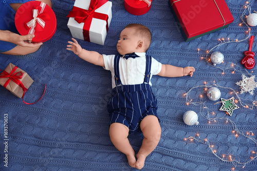 Cute little baby with gift ...