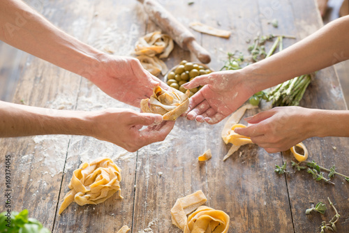 Canvas Print Raw homemade pasta and hands