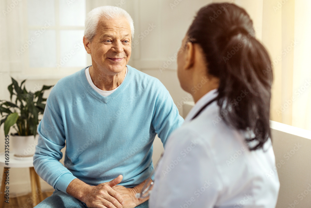 Cheerful elderly man smiling Cheerful elderly man smiling
