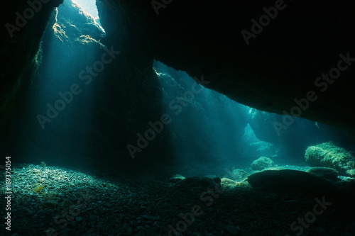 Underwater cave with sunlight from a hole, natural scene, Mediterranean sea, Pyrenees Orientales, Roussillon, France