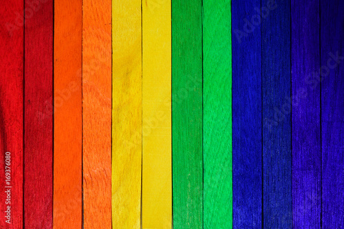 Natural Wooden Rainbow colored. Painted Wooden Multicolored.Rainbow wooden Background.