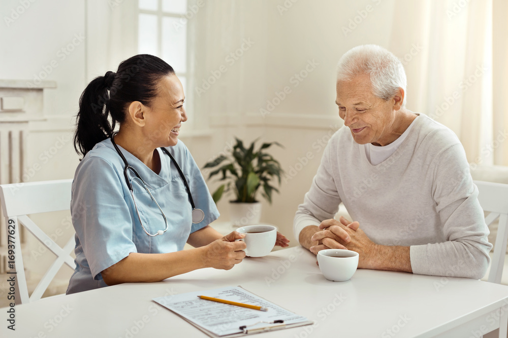 Happy joyful people having a pleasant conversation Happy joyful people having a pleasant conversation