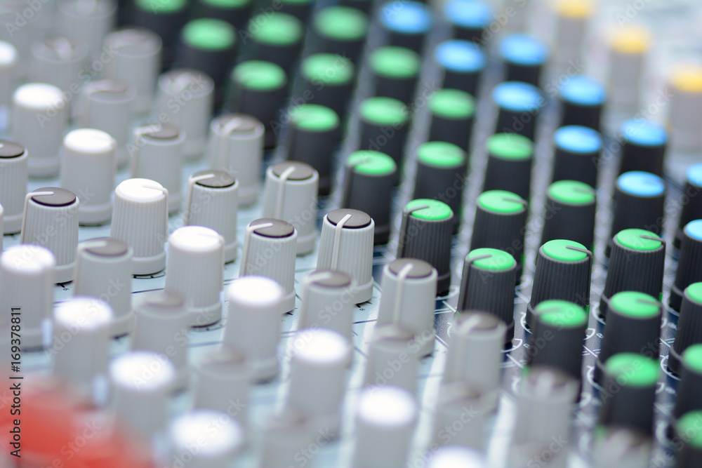 The remote sound engineer. Remote control of the sound engineer shallow depth of field. The remote sound engineer. Remote control of the sound engineer shallow depth of field.