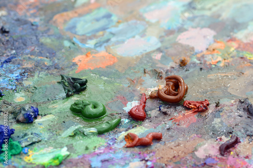Image of bright oil-paint palette closeup. Painter palette.  © cherokee4