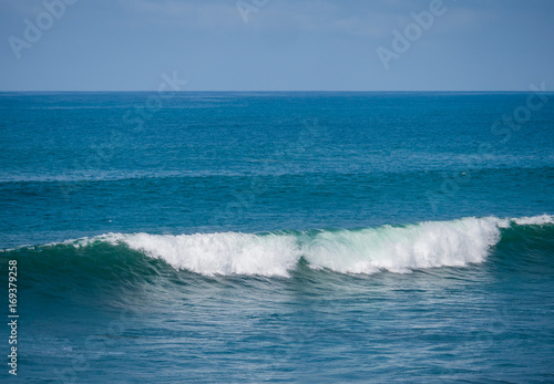 Blue wave in tropical ocean.