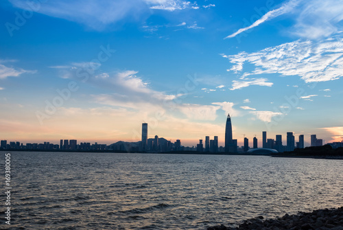 Seaside city at sunset time