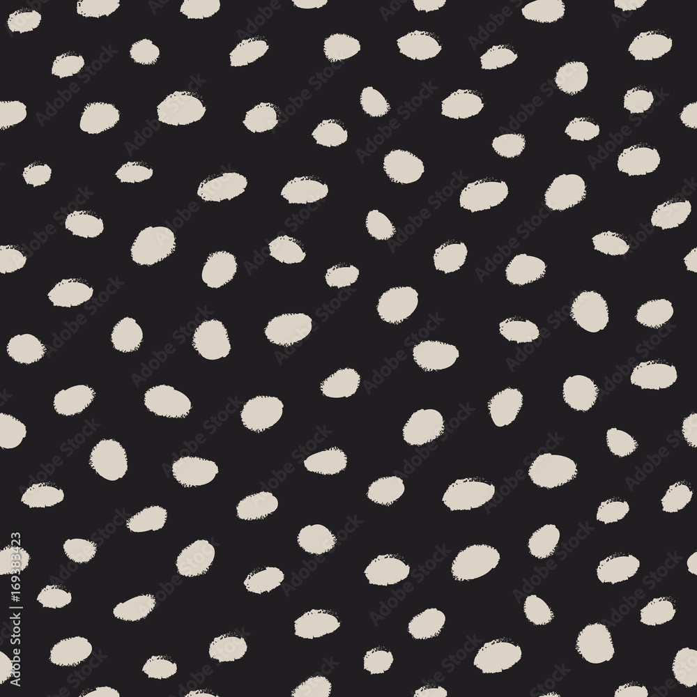 Brush stroke ink random dots seamless vector pattern. Hand drawn black and white grungy speckles and spots fashionable texture. Endless repeated chic background for print, textile, or web. Brush stroke ink random dots seamless vector pattern. Hand drawn black and white grungy speckles and spots fashionable texture. Endless repeated chic background for print, textile, or web.