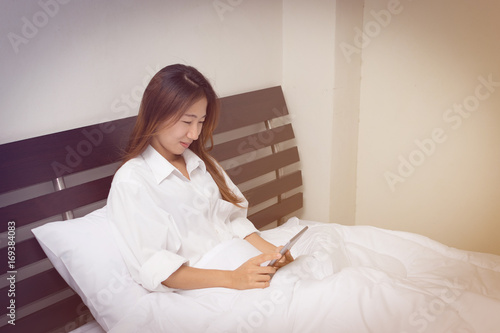asian girl using a tablet