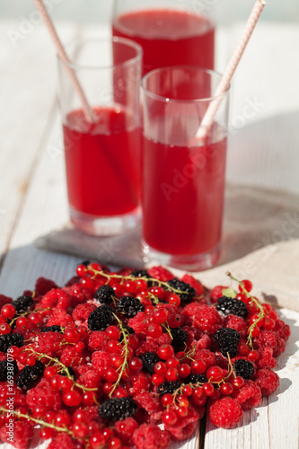 Drink of berries on a light background