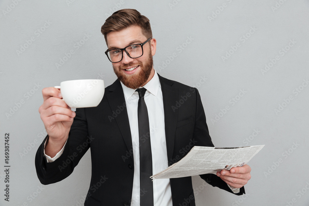 Happy smiling businessman in suit and eyeglasses Happy smiling businessman in suit and eyeglasses