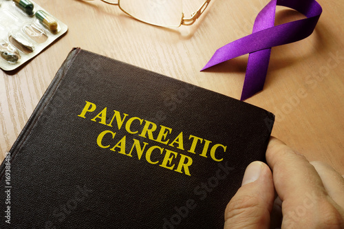 Symbol of pancreatic cancer. Purple awareness ribbon photo