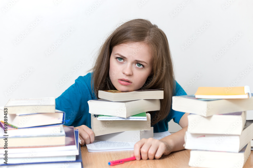 White cute girl asleep and tired of studying, stressed White cute girl asleep and tired of studying, stressed