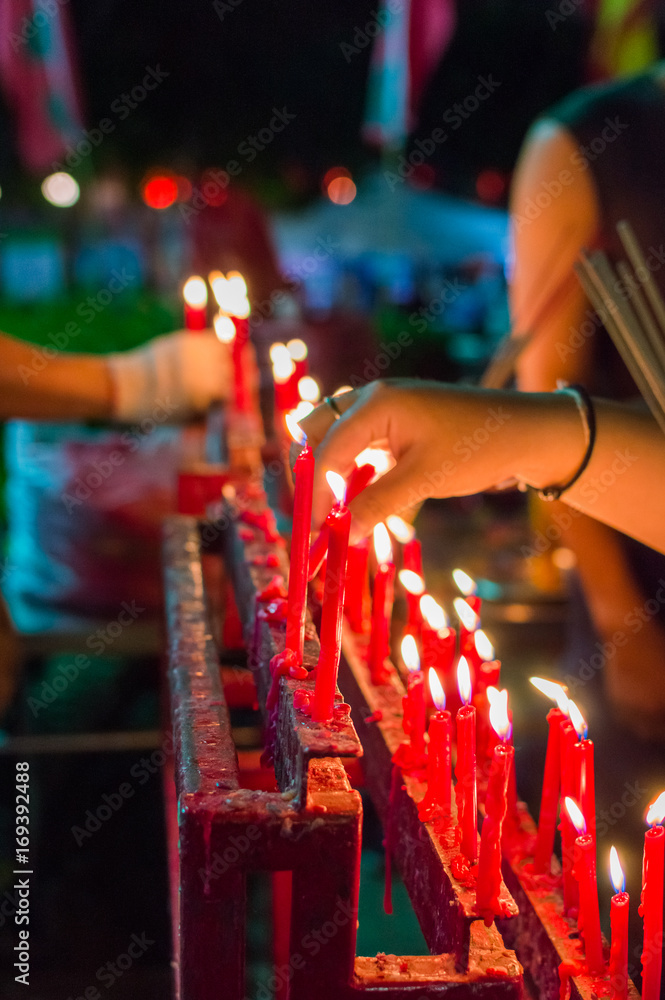 Burning red chinese candle in temple Burning red chinese candle in temple