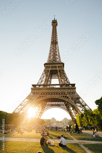 Paris, France - June 19, 2017: View of Eiffel tower, view from Champ de Mars in the morning with a blue sky in a background