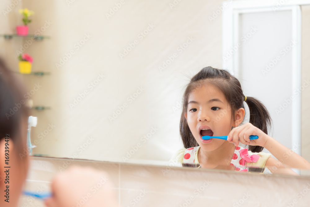 pretty lovely little kid girl looking at mirror pretty lovely little kid girl looking at mirror