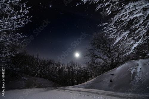 Winter's landscape in the night of tuscany's hills. Pian della Rasa, Cantagallo, Toscana, Italia photo