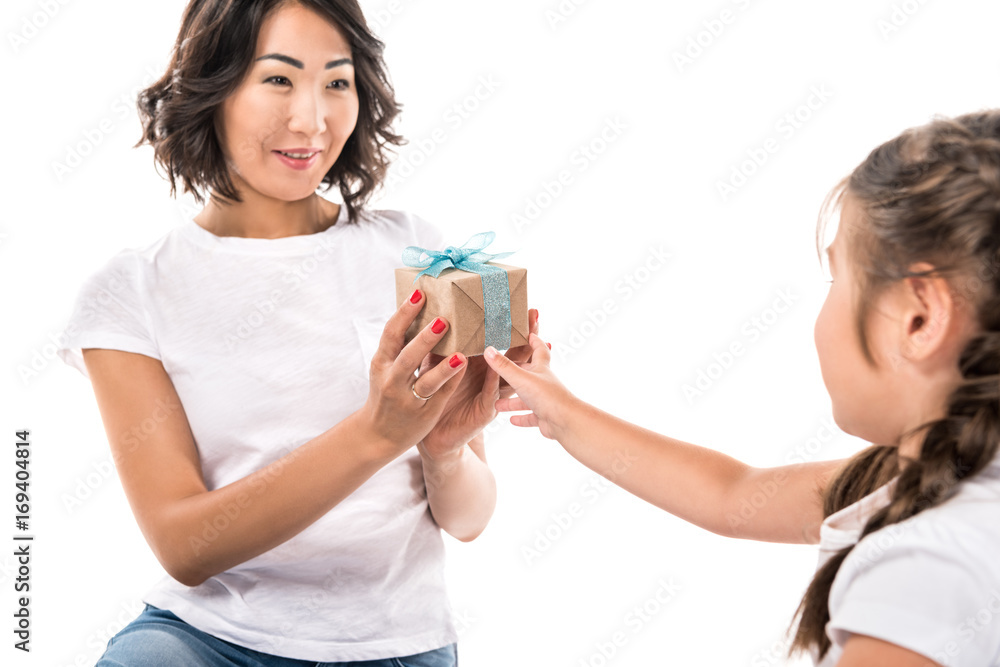asian mother and daughter with gift box, isolated on white asian mother and daughter with gift box, isolated on white