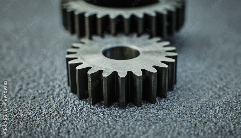 Gears auto set on the rude surface close up Gears auto set on the rude surface close up