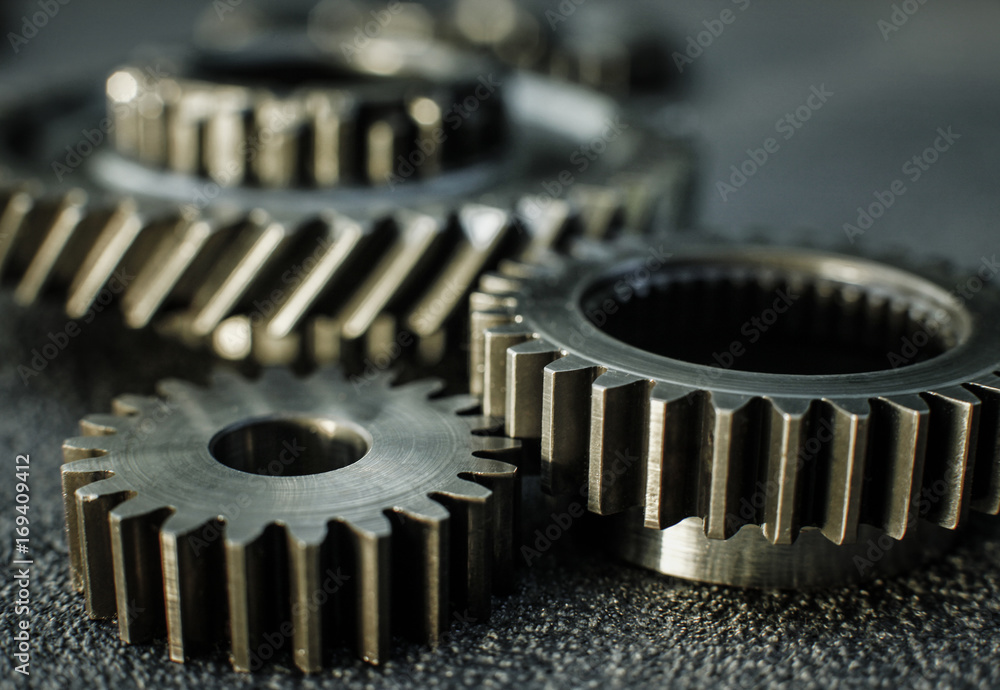 Gears auto set on the rude surface close up Gears auto set on the rude surface close up