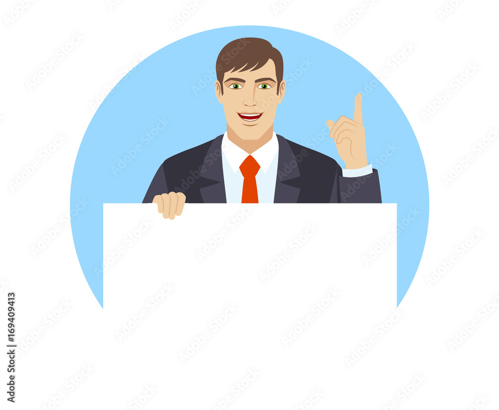 Businessman holding white blank poster and pointing up Businessman holding white blank poster and pointing up