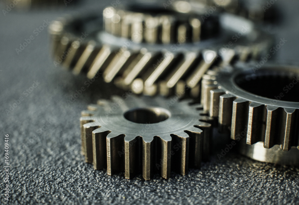 Gears auto set on the rude surface close up Gears auto set on the rude surface close up