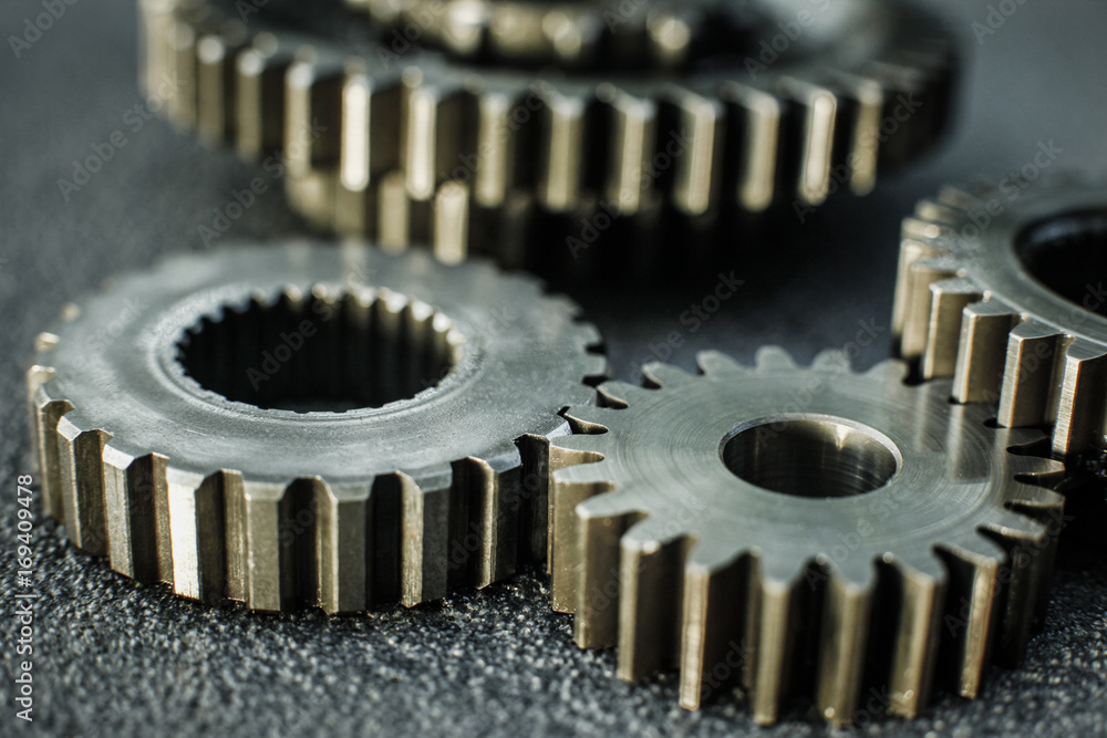 Gears auto set on the rude surface close up Gears auto set on the rude surface close up