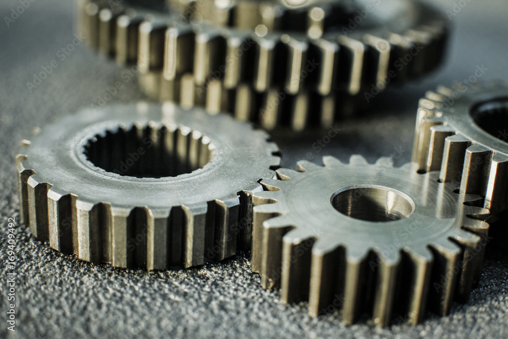 Gears auto set on the rude surface close up Gears auto set on the rude surface close up