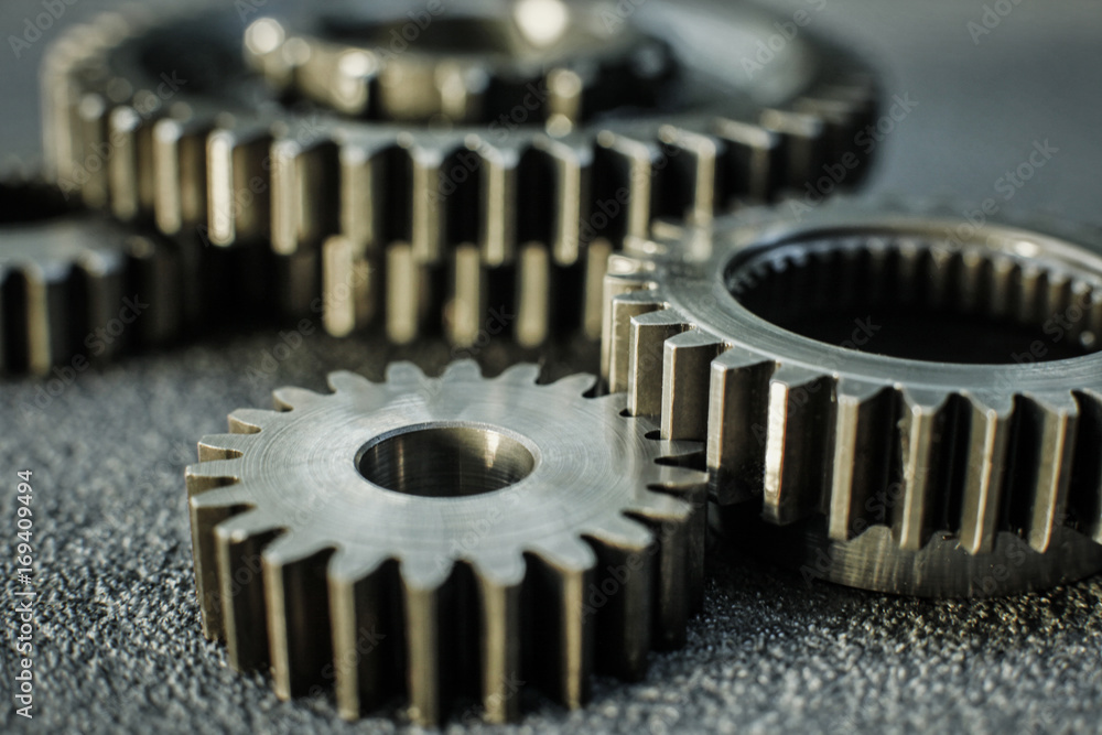 Gears auto set on the rude surface close up Gears auto set on the rude surface close up