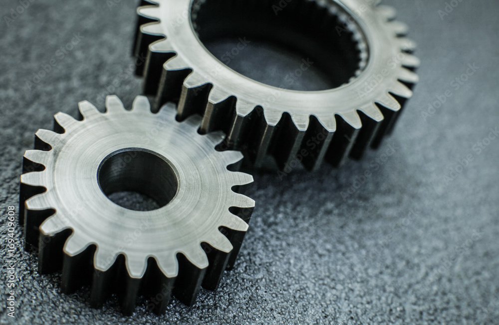 Gears auto set on the rude surface close up Gears auto set on the rude surface close up