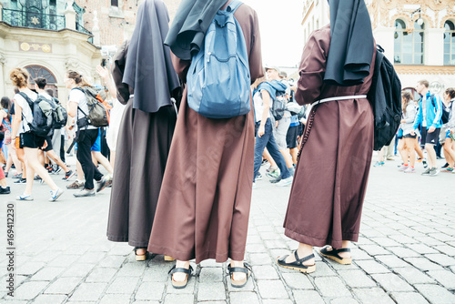 nun feet in crowd