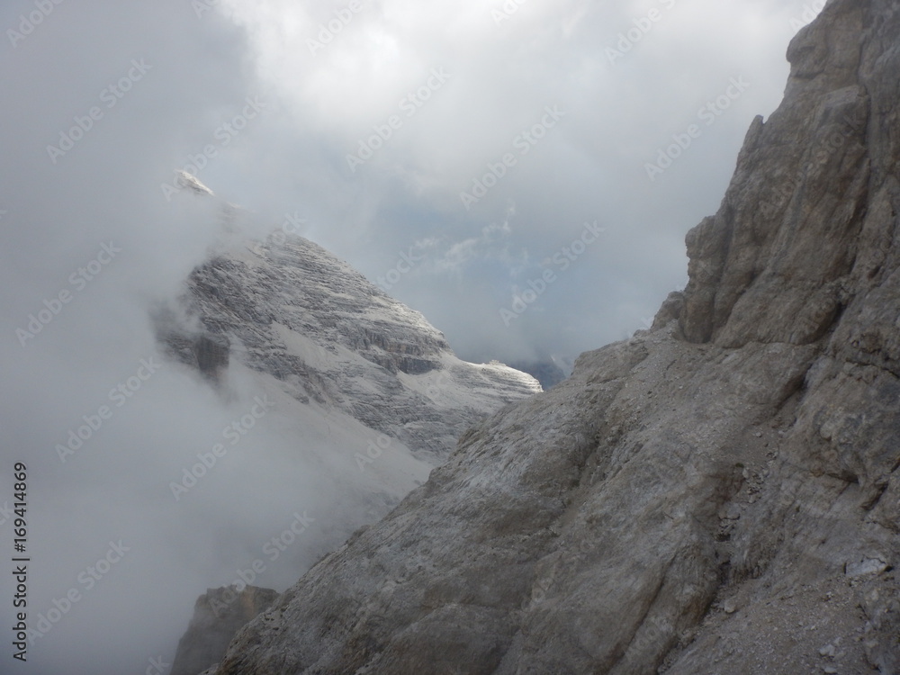 mountaineering on Tofana ridge in dolomites