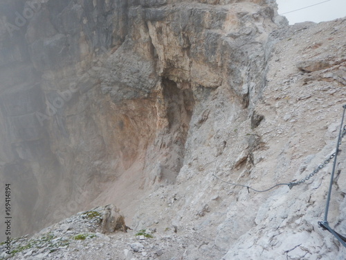 mountaineering on Tofana ridge in dolomites