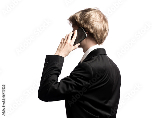 Businessman profile using cellphone isolated on a white background