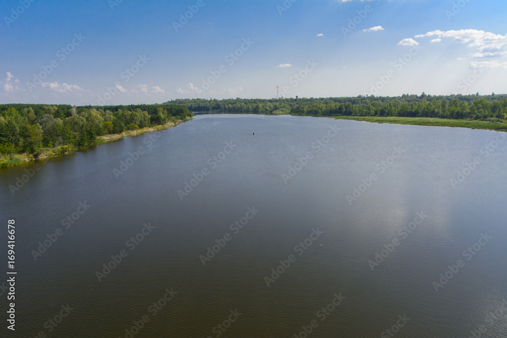 A beautiful river landscape and trees in a dead radioactive zone. Consequences of the Chernobyl nuclear disaster, August 2017. A beautiful river landscape and trees in a dead radioactive zone. Consequences of the Chernobyl nuclear disaster, August 2017.