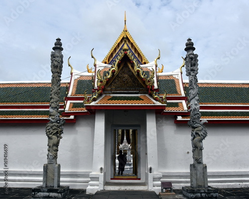 Wallpaper Mural Delicate decoration on the door in Wat Arun (Bangkok, Thailand), the temple of Dawn on the Chao Phraya river. Torontodigital.ca