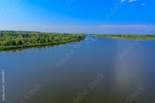 A beautiful river landscape and trees in a dead radioactive zone. Consequences of the Chernobyl nuclear disaster, August 2017.