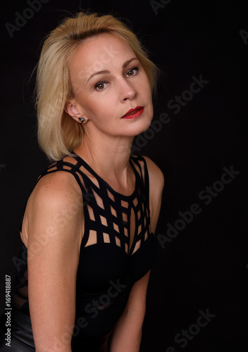beautiful mature woman portrait on black