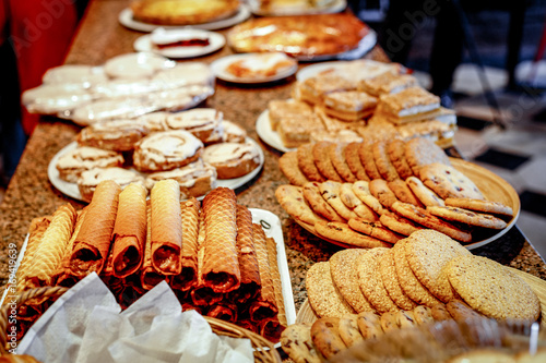 different types of sweet pastries on plates