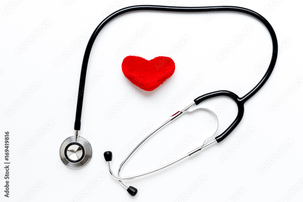 stethoscope on white background with plush heart stethoscope on white background with plush heart
