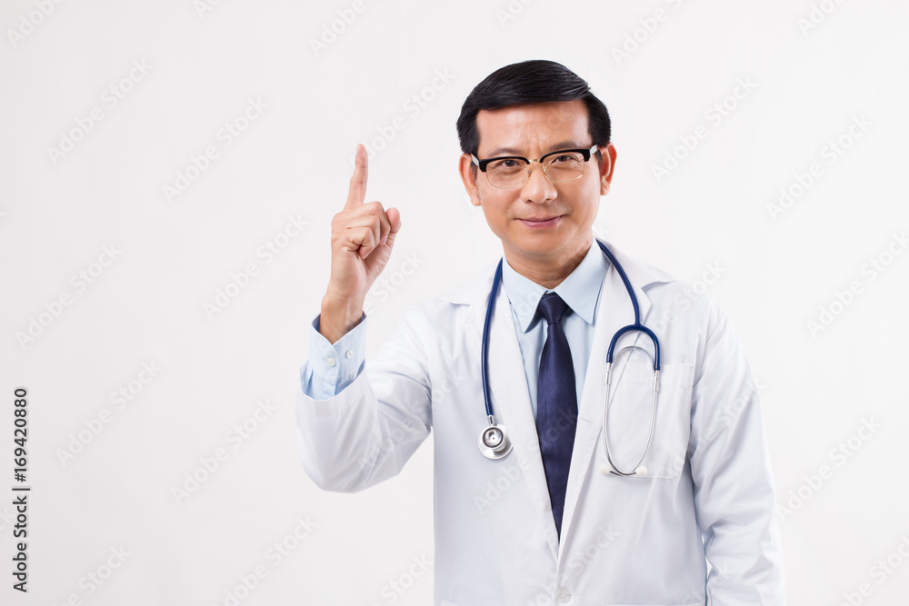 confident asian male doctor pointing up 1 finger confident asian male doctor pointing up 1 finger