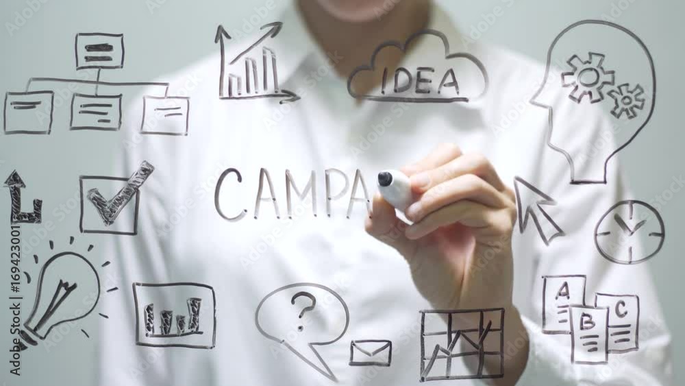 Woman writing CAMPAIGN on transparent screen. Businesswoman write on board. Woman writing CAMPAIGN on transparent screen. Businesswoman write on board.