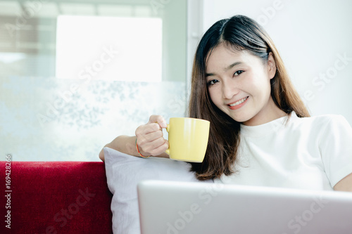 Young asian girl is freelancer with her private business at home office, working with laptop, coffee, online marketing, Customer order and packaging or packing.