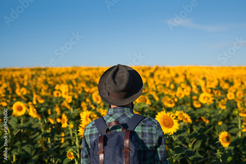 Tourist standing in flowers