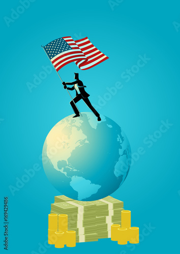 Businessman holding the flag of USA on world globe