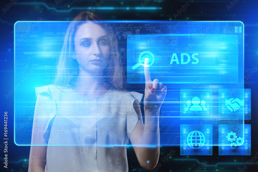 The concept of business, technology, the Internet and the network. A young entrepreneur working on a virtual screen of the future and sees the inscription: ADS The concept of business, technology, the Internet and the network. A young entrepreneur working on a virtual screen of the future and sees the inscription: ADS