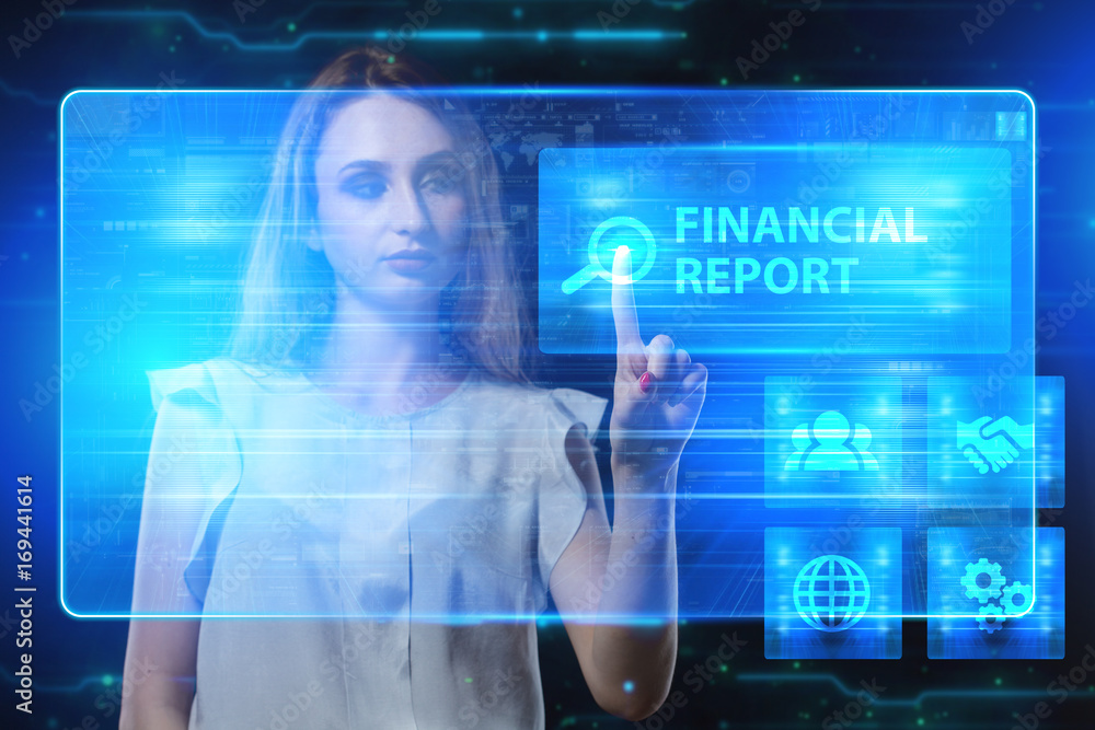 The concept of business, technology, the Internet and the network. A young entrepreneur working on a virtual screen of the future and sees the inscription: Financial report The concept of business, technology, the Internet and the network. A young entrepreneur working on a virtual screen of the future and sees the inscription: Financial report