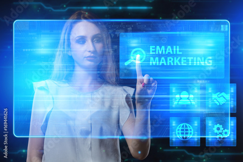 The concept of business, technology, the Internet and the network. A young entrepreneur working on a virtual screen of the future and sees the inscription: Email marketing