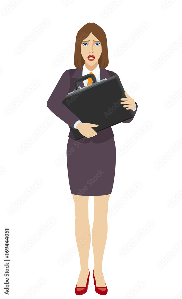 Businesswoman with two hands grabbed the briefcase Businesswoman with two hands grabbed the briefcase