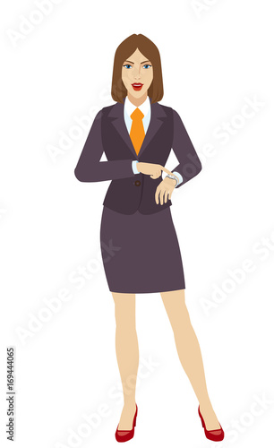 Businesswoman pointing at her watch
